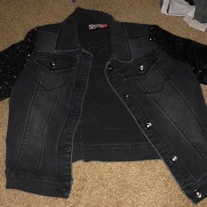 Jean jacket with sparkling sleeves